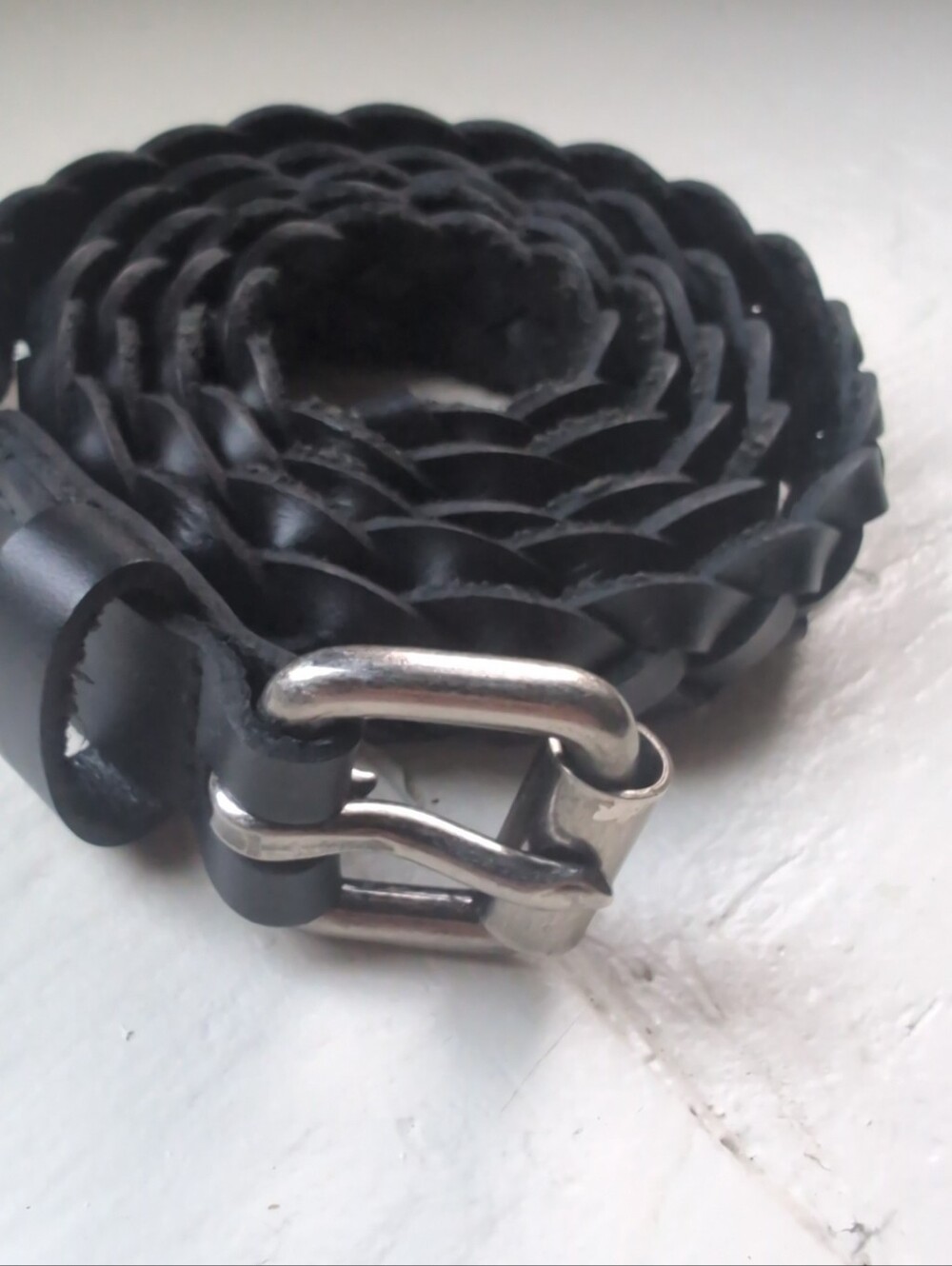 Black real leather fully adjustable braided skinny belt with silver tone buckle